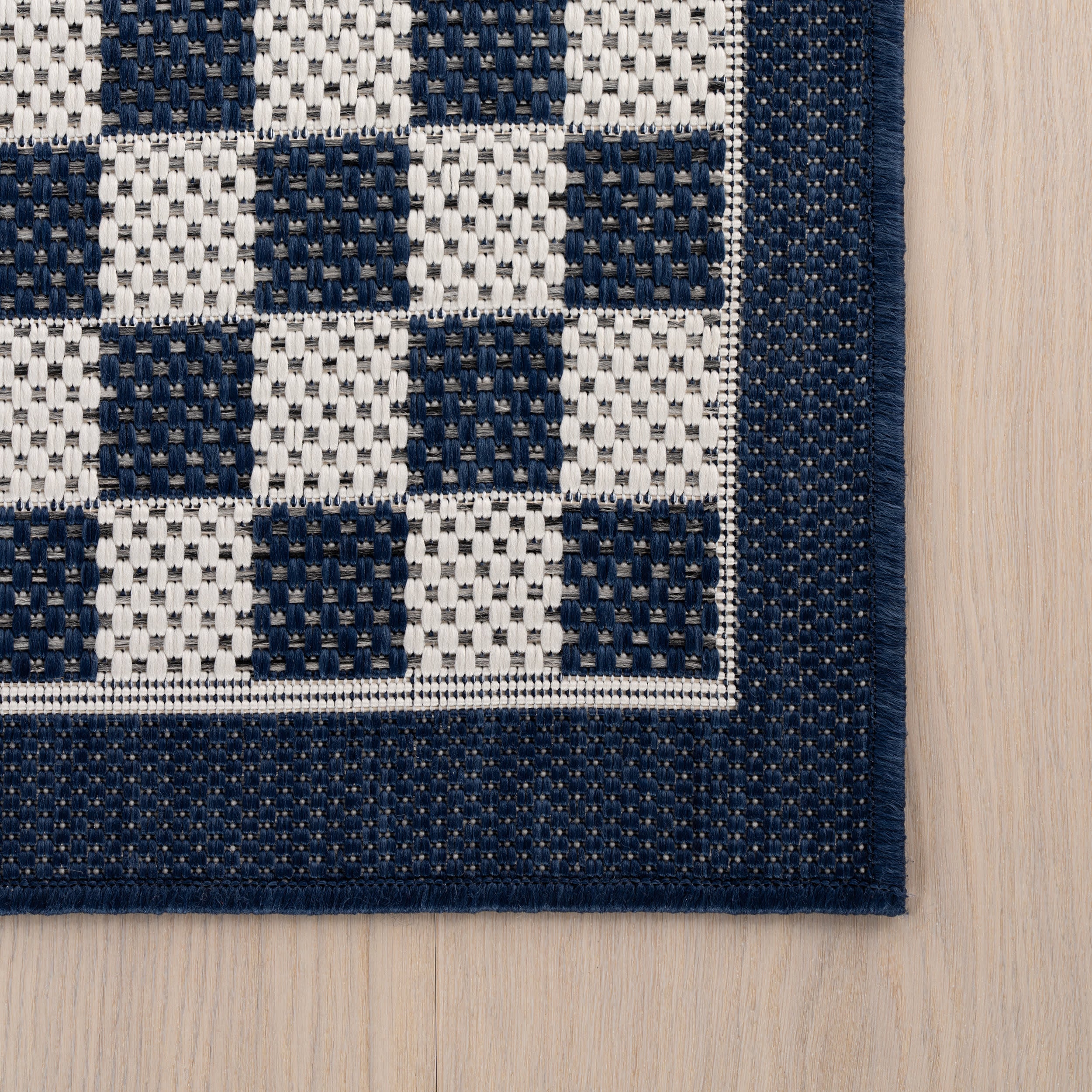 Zyrah Modern Checkered Indoor/Outdoor Rug | Navy - Image 4
